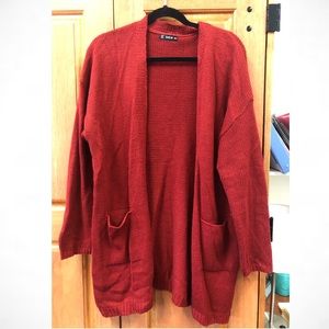 Women’s red long knit pocket cardigan